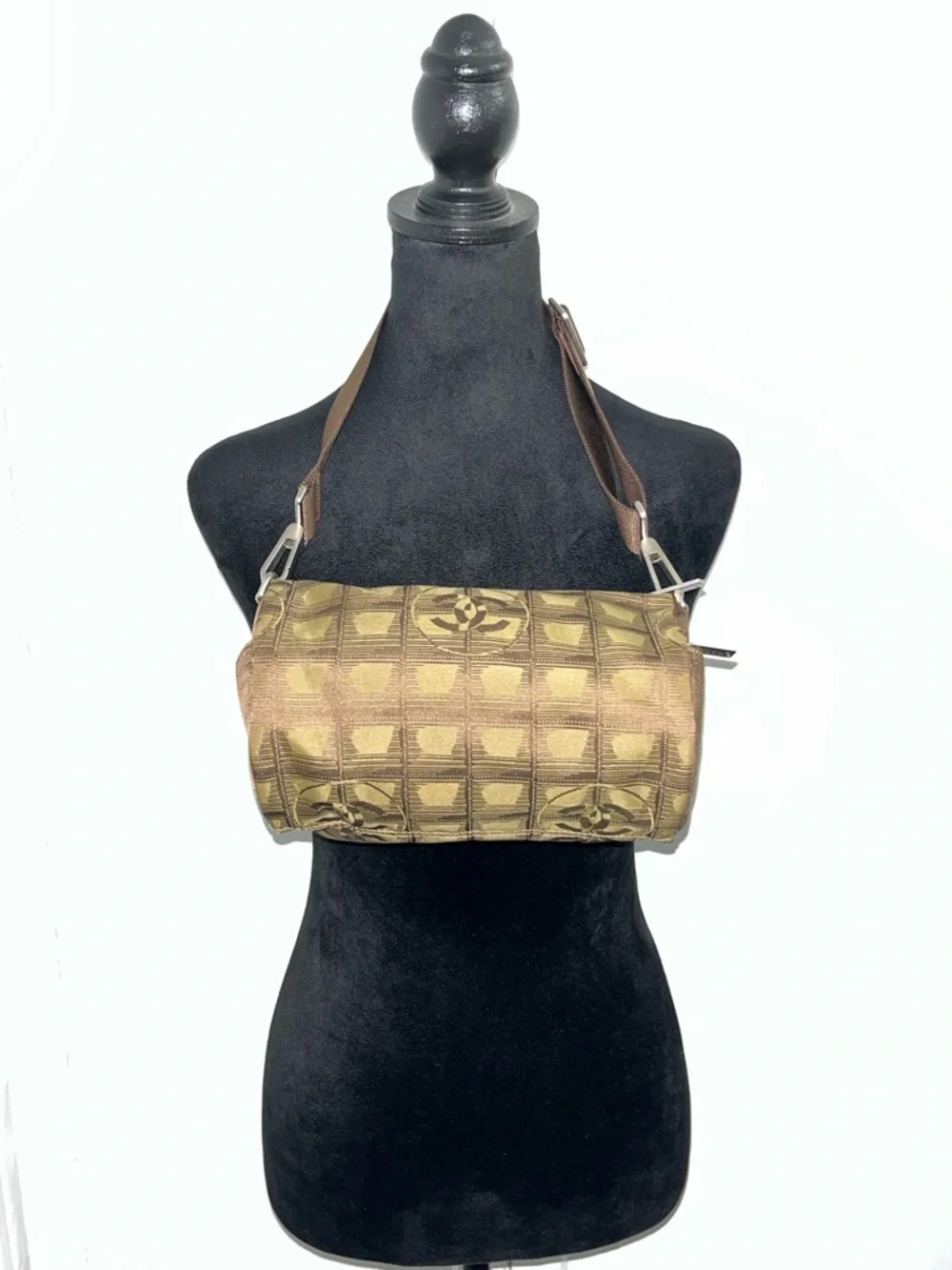 Chanel New Travel Line Mini Roll or Barrel Bag in a khaki or olive green color